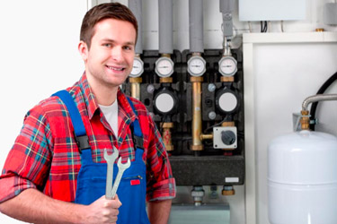 Gas Safe registered heating engineer servicing a gas boiler in Bristol