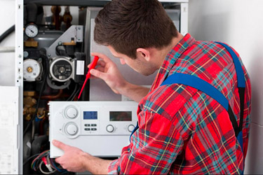 Gas Safe registered heating engineer servicing a gas boiler in Bristol